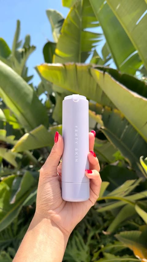 Instagram post by @joyjah for FENTY SKIN. Caption reads: [...] outsiiiide on vacation ☀️🌴 @fentyskin Hydra....
