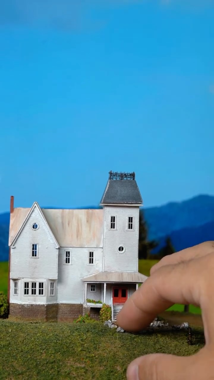 Instagram post by @davidminiatures for Beetlejuice. Caption reads: A creepy look back at the house from Beetlejuice I....