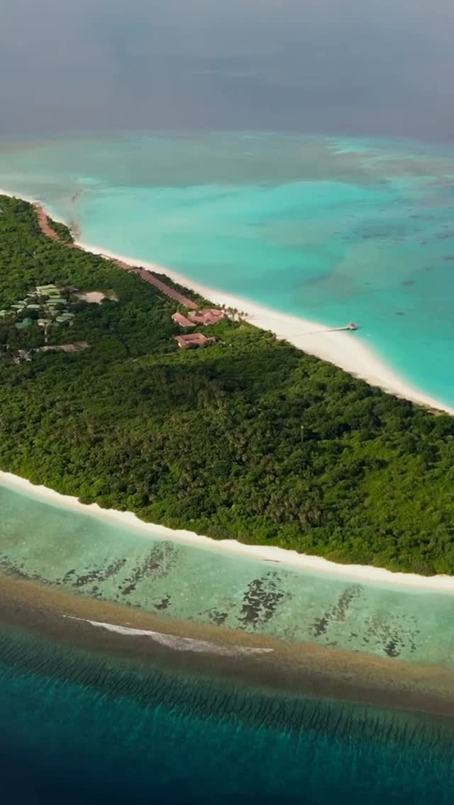 Instagram post by @hondaafushiislandresort for Visit Maldives. Caption reads: [...] 💚 #WorldsBiggestGiveaway #VisitMaldives....