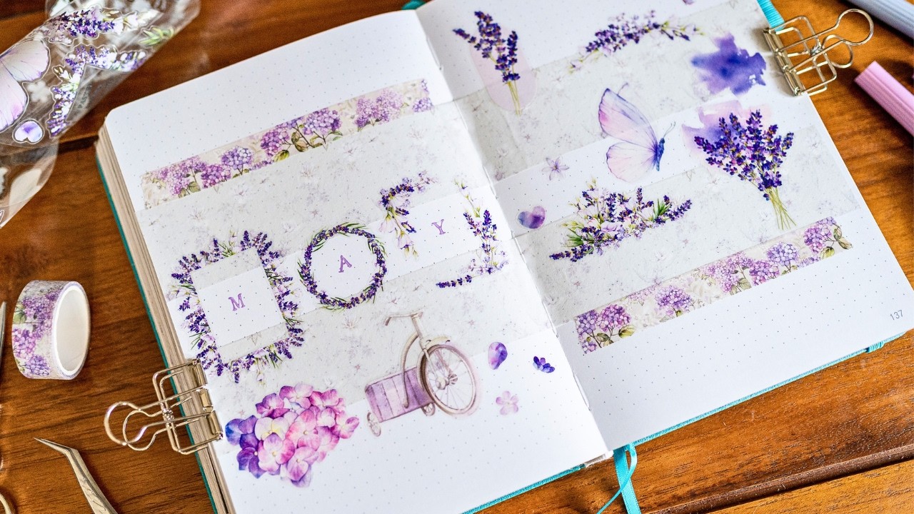 YouTube post by @ErinSmith for – Stationery Pal. Caption reads: EASY May Bullet Journal Theme - Purple Florals 📖....