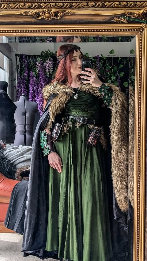 Instagram post by @thescarletthuntress for HolyClothing. Caption reads: Help me choose which outfit to wear to the....