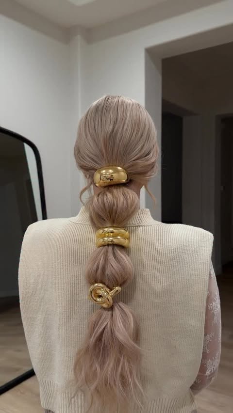 Instagram post by @hairbybreanna_ for L'ange Hair. Caption reads: HOLIDAY HAIRSTYLE ❤️✨ using two different tools....