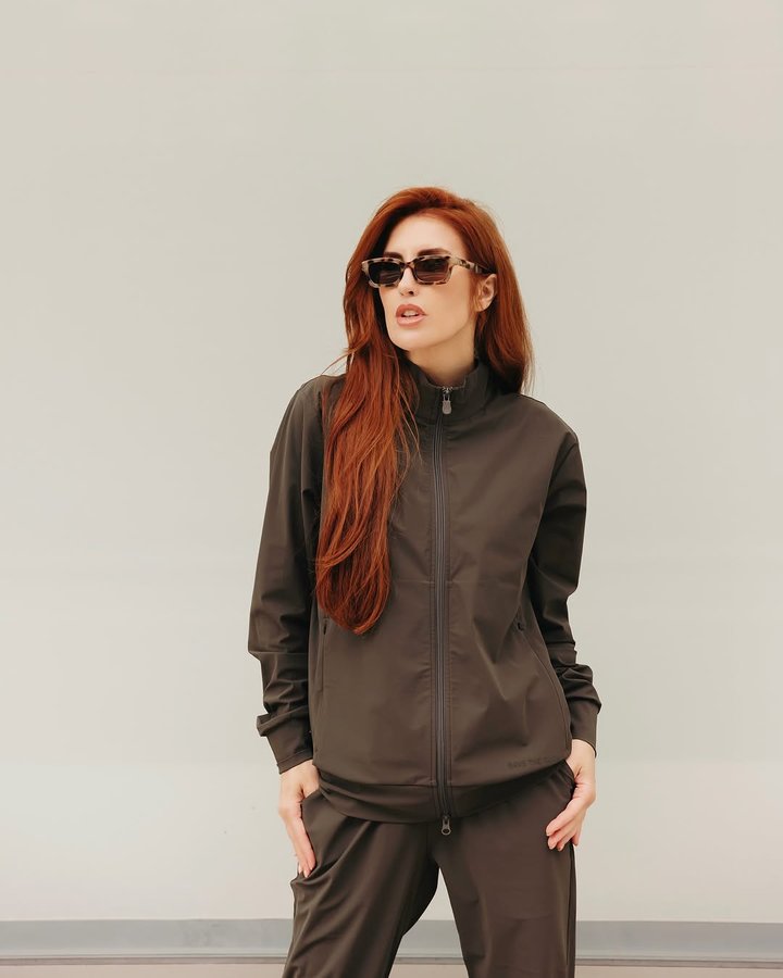 Instagram post by @meganlinkeofficial for Save The Duck. Caption reads: Feeling powerful as a woman with....