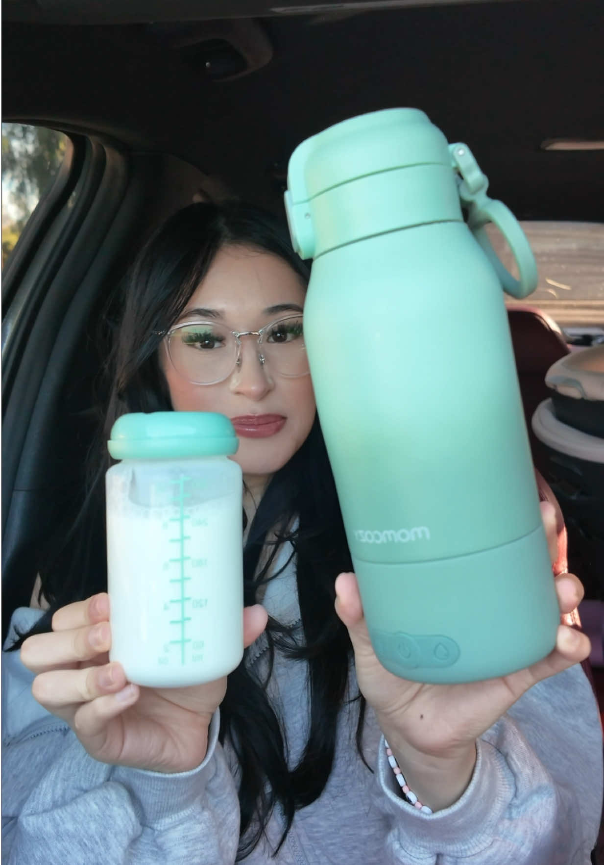 TikTok post by @jaackiecalderon for Momcozy. Caption reads: these make my life so much easier 😍🤍 CODE:....