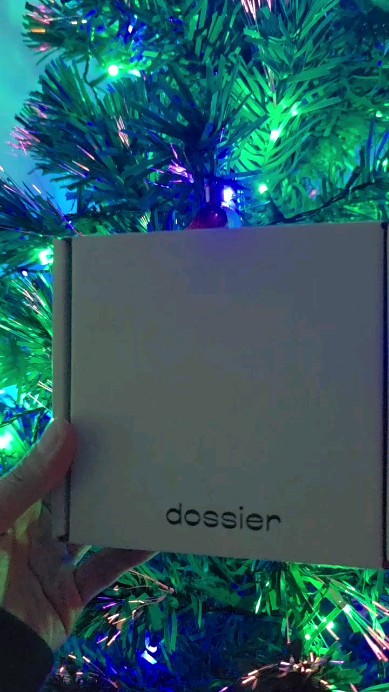 Instagram post by @tomi_nico24 for Dossier. Caption reads: Scent for the day @dossierperfumes in Fruity....