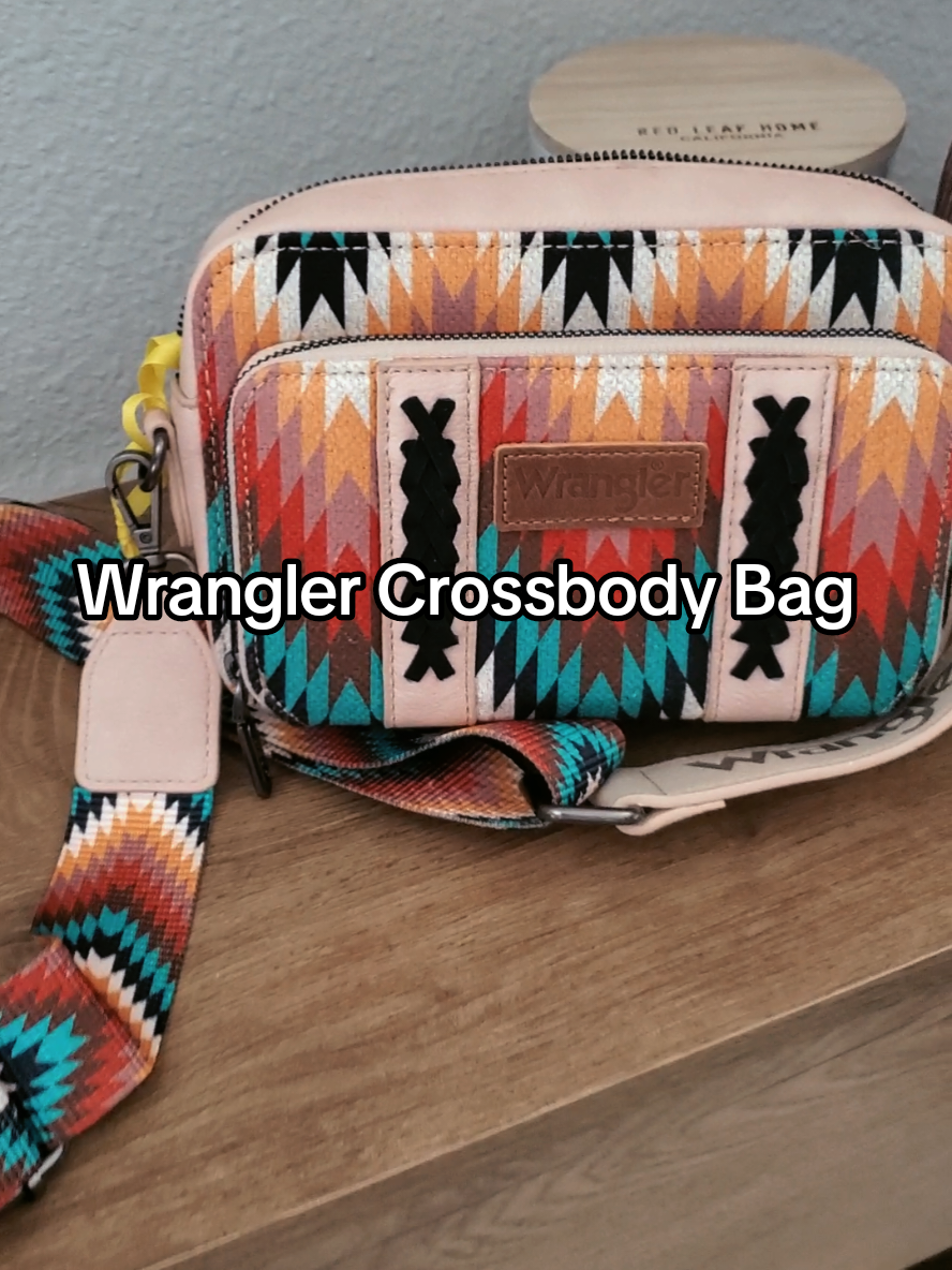 TikTok post by @nadia.tts520 for Vaqueras Outfitters. Caption reads: @Wrangler @Vaqueras Outfitters #wranglerpurse....
