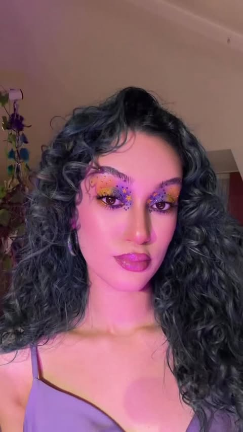Instagram post by @sudegencer_ for L'Oréal ContentPRO. Caption reads: Kinda in love with this look💜💛 #makeup....