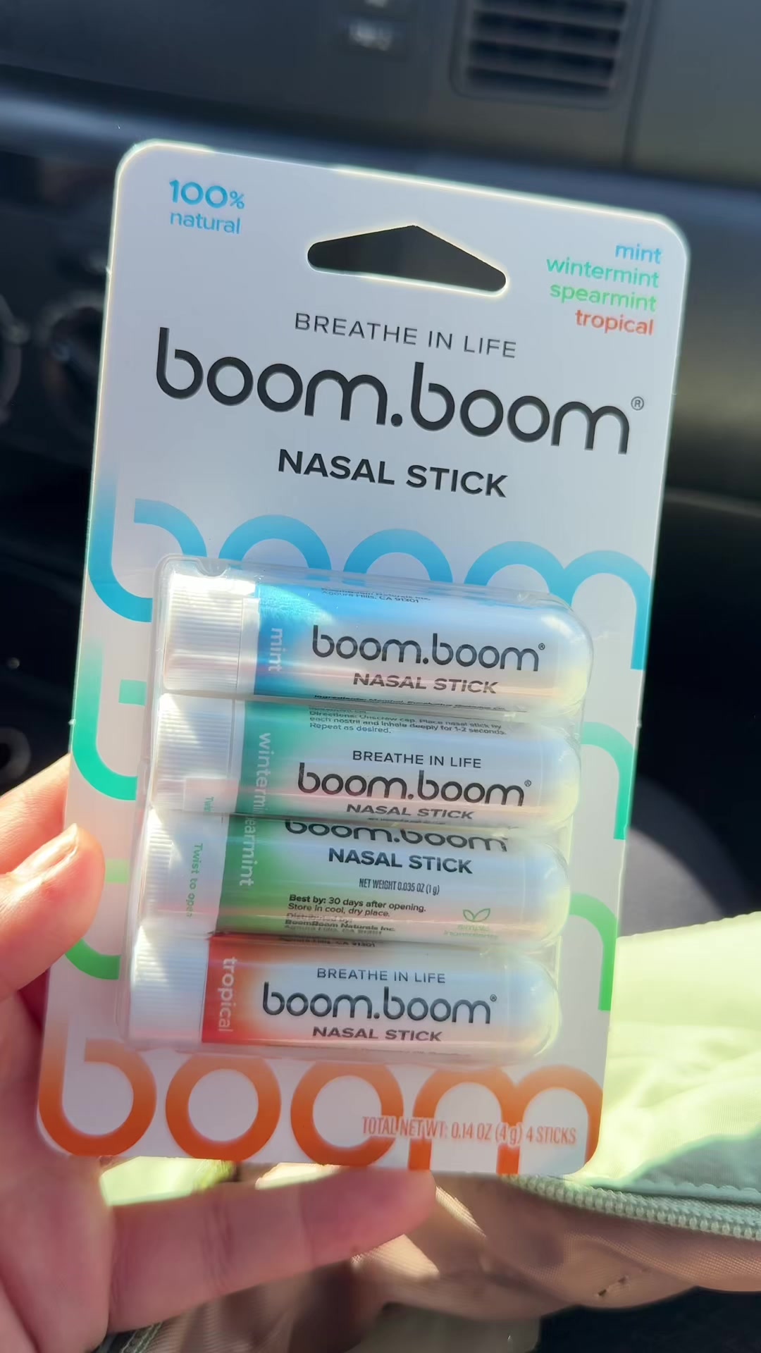 TikTok post by @karinaxchavez for BoomBoom Naturals. Caption reads: @BoomBoom 💚 #nasalstick #boomboom #tiktokviral....