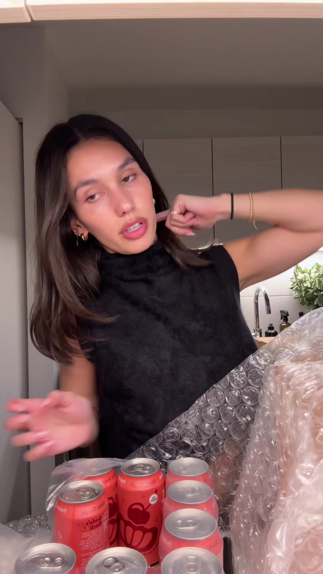 TikTok post by @emersonarena2 for Poppi. Caption reads: Ben keeps stealing all of my poppi’s!! 🥹....