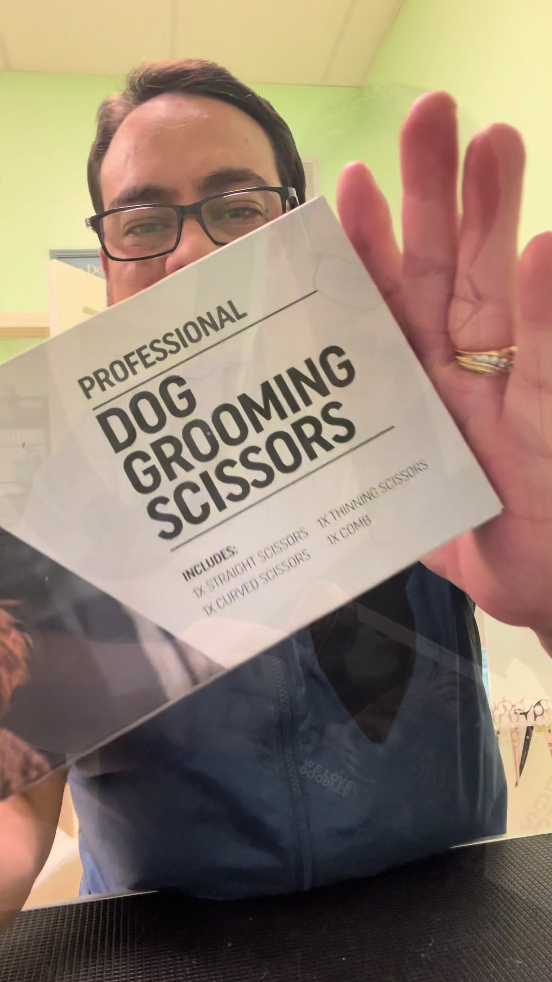 TikTok post by @carlosthegroomer for We Love Doodles. Caption reads: [...] this great set of Groomimg Shears.....