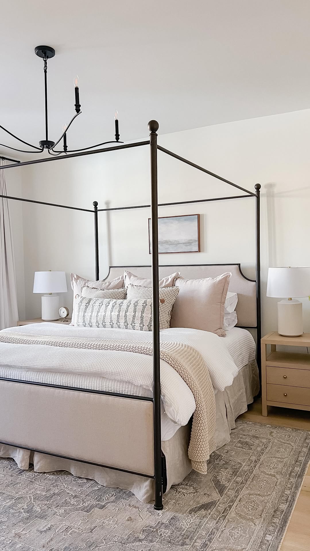 Instagram post by @remingtondesignco for Coop Sleep Goods. Caption reads: My recipe for a cozy layered bed! Comment BED....