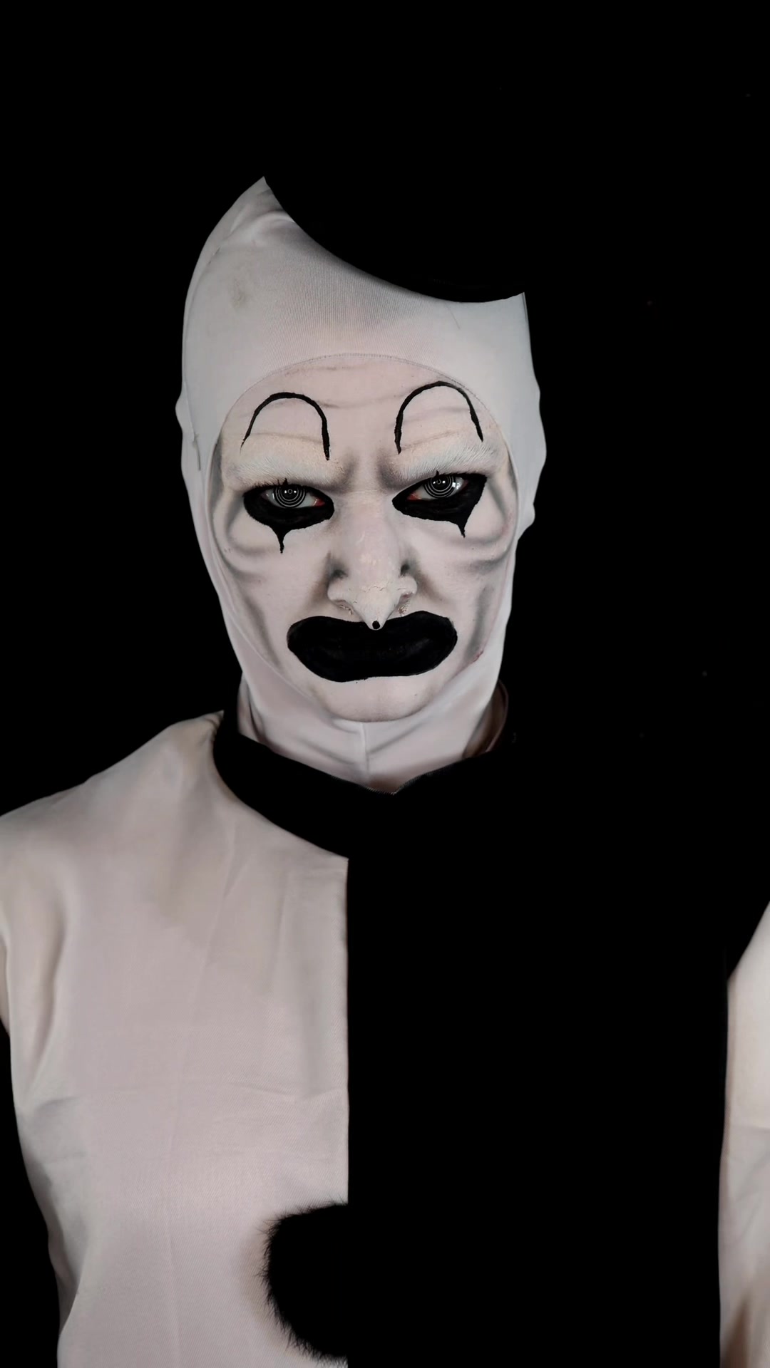 TikTok post by @svalabb for PinkyParadise. Caption reads: Smiling one second… terrifying the next 🤡🩸....