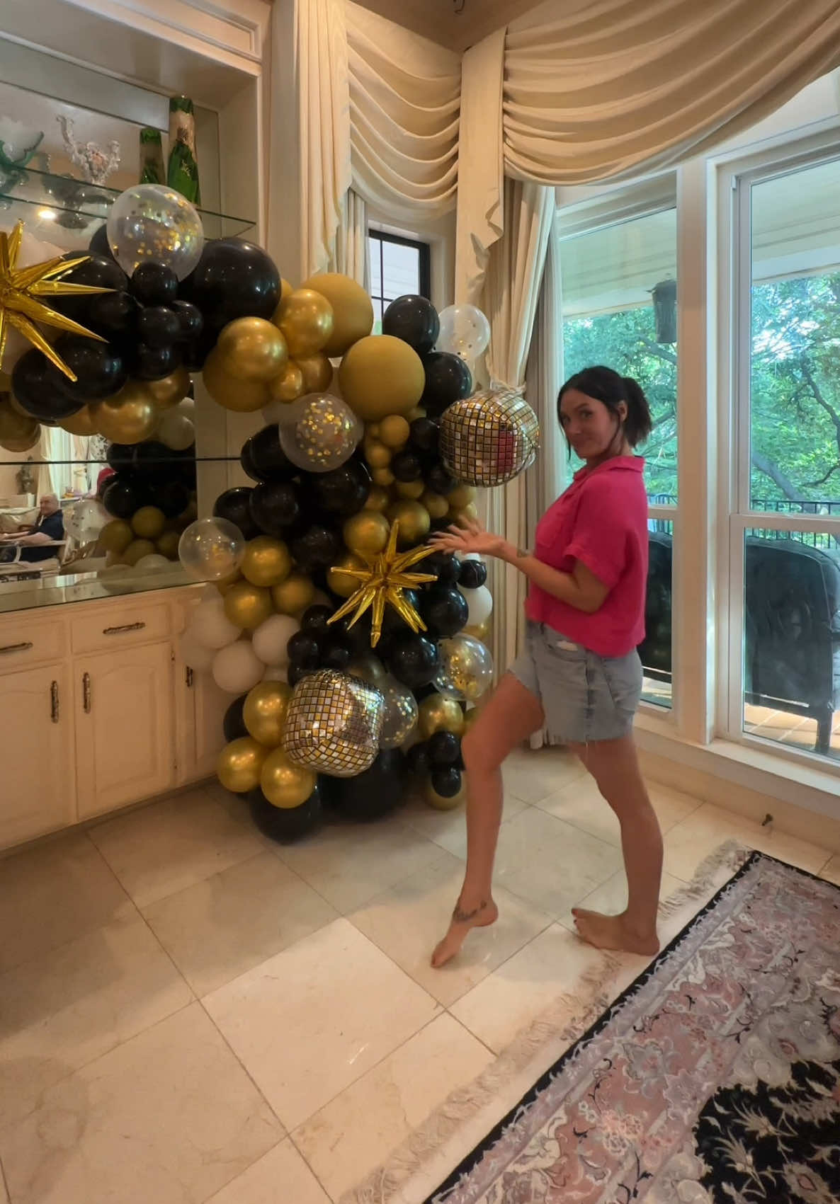 TikTok post by @positively_paige for Michaels Stores. Caption reads: Decorating for Vance’s graduation party made easy....