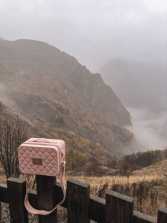 Instagram post by @macaroonsandroses for Beautifect. Caption reads: Never without my @beautifect vanity bag 💗 Swipe....