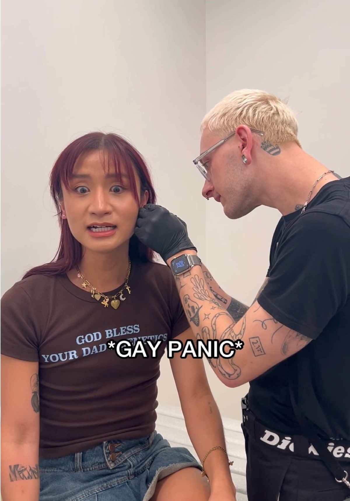 TikTok post by @flawlesskevin for Studs. Caption reads: Getting my ears pierced for the first time EVER....