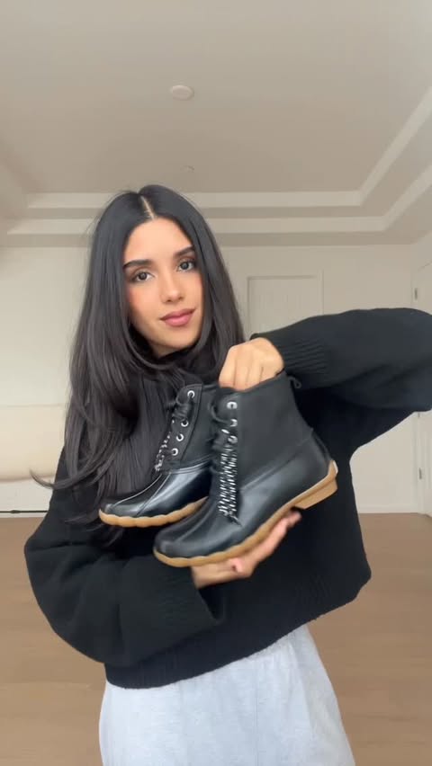 Instagram post by @paolabarro for Sperry. Caption reads: Styling my @sperry Duck Boots because cozy season....