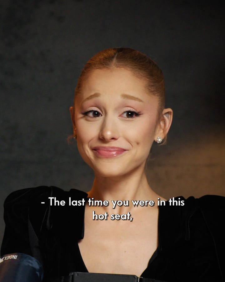 Instagram post by @arianagrande for Vanity Fair. Caption reads: Back in the hot seat, @arianagrande sets the....