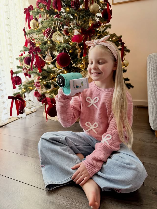 Instagram post by @erin.grace.b for Canal Toys. Caption reads: [...] with her new camera projector from....