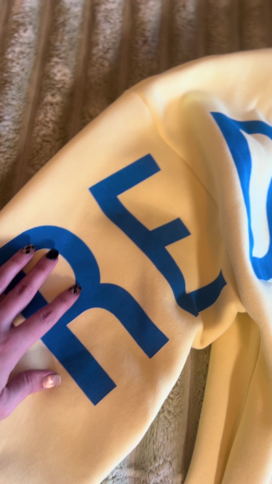 TikTok post by @kait_rainey for God's Love Overcomes. Caption reads: Christian apparel that’s stylish, comfy, and....