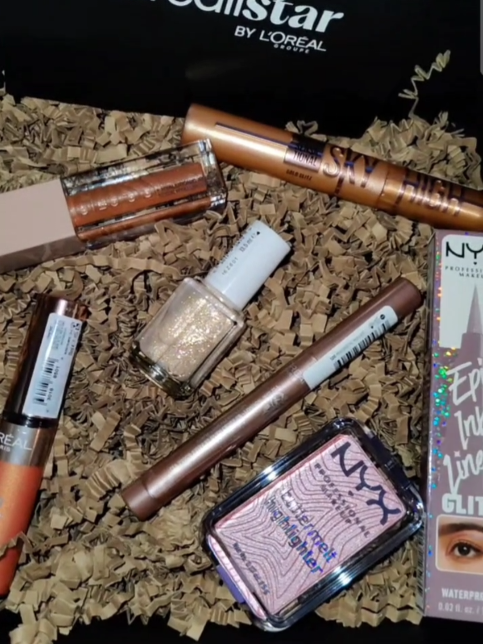 TikTok post by @verabeautytrends for NYX Professional Makeup HR. Caption reads: Let's unbox The Glow Christmas selection🩷....