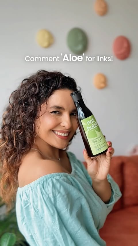 Instagram post by @chitrashi for Nat Habit®. Caption reads: [...] softer, bouncier, less-frizzy curls.....