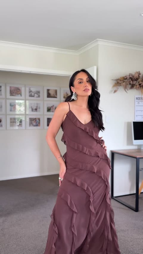 Instagram post by @larissadeanacarlson for Flo & Frankie. Caption reads: HELP! This or that @floandfrankie dress?!? Brown....