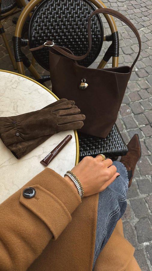 Instagram post by @cristinasurdu for COEUR DE LION Jewellery. Caption reads: Skirts, trousers or dresses? Your fav? Three....