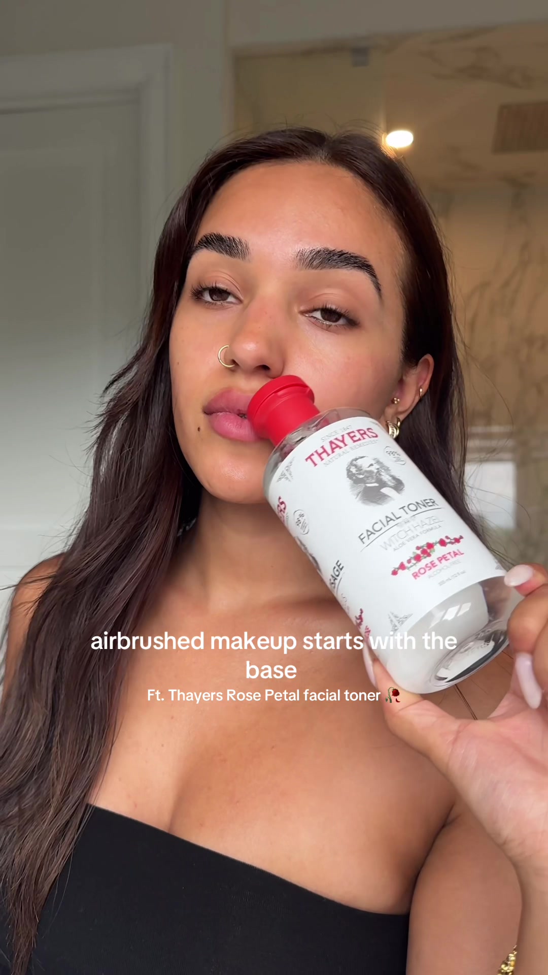 TikTok post by @anjana.dhimann for Thayers. Caption reads: An airbrushed makeup base starts with the skin....