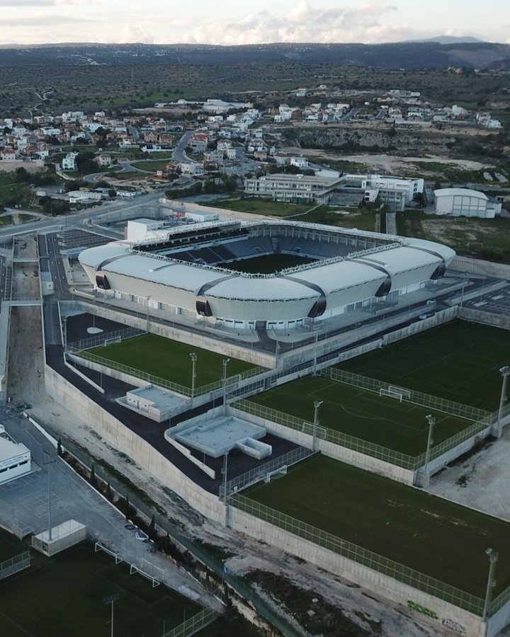 Instagram post by @stadiums.de for Bleacher Report. Caption reads: Alphamega-Limassol Stadium, Kolossi, Limassol....