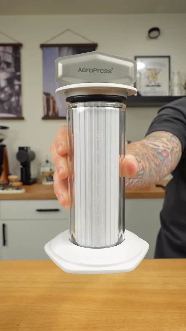 Instagram post by @alexhomebarista for AeroPress. Caption reads: The Aeropress is my favorite brewer. 
Use code:....