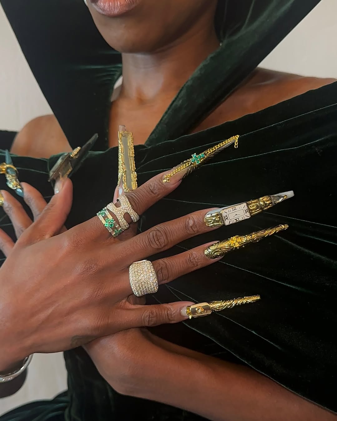 Instagram post by @clawzbydior_ for Aquaphor US. Caption reads: #ad Gilded Gold CLAWZ @cynthiaerivo ⚜️From cuticle....