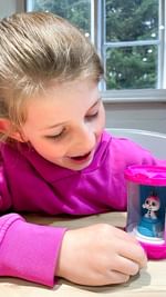 Instagram post by an influencer for Disney Doorables. Caption reads: AD | Disney Doorables Micro Motion - [...].