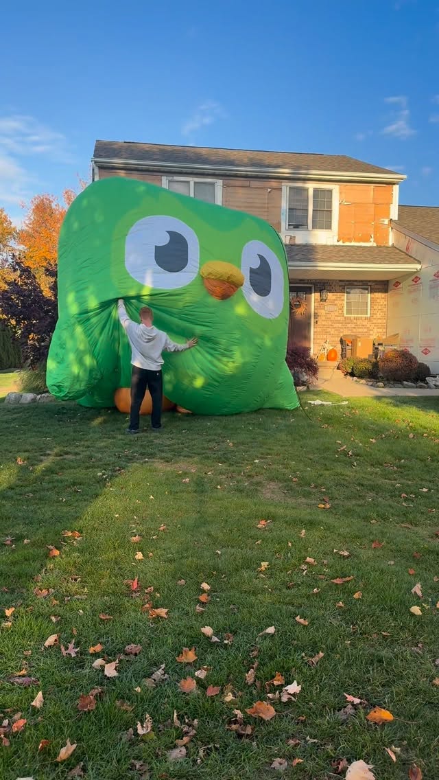 Instagram post by @corbinmillet for Duolingo. Caption reads: Gonna get him a hat and dress him up for....