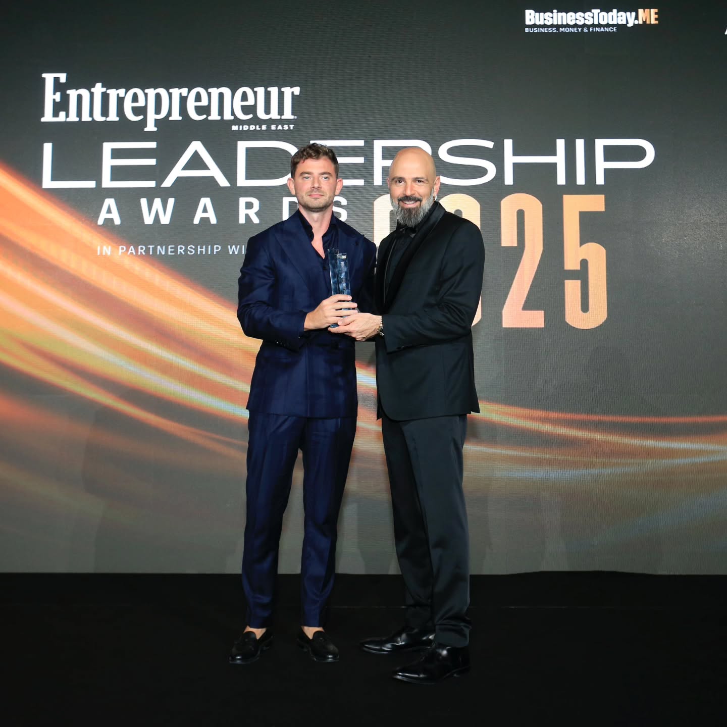Instagram post by @alexanderlozben for Entrepreneur. Caption reads: [...] Leader of the Year award! 

The Entrepreneur....