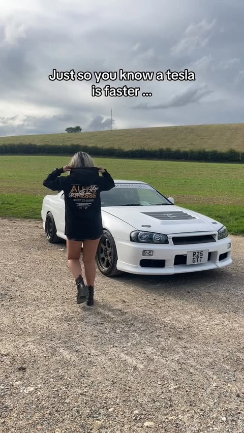 Instagram post by @thatskylinegal for Auto Finesse. Caption reads: [...] me a tesla is faster? 🤓 20% OFF....