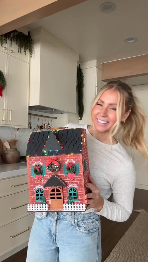 Instagram post by @rebekahmarsden for Michaels Stores. Caption reads: THE HOLIDAY DOLLHOUSE🎄🏠
comment HOLIDAYS for all....