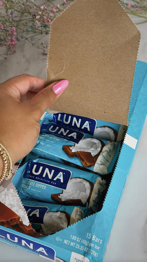 Instagram post by @raeatanielu for LUNA Bar. Caption reads: 🥥🩵 A little mid day snack break and I’m reaching....