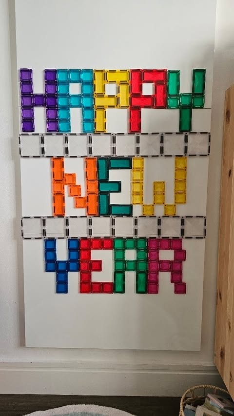 Instagram post by @katie_rose_family for Connetix Tiles. Caption reads: 𝗛𝗮𝗽𝗽𝘆 𝗡𝗲𝘄 𝗬𝗲𝗮𝗿 Wishing everyone a very....