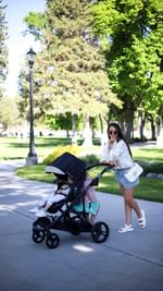 Instagram post by @karinabbingham for Baby Trend. Caption reads: This Stroller from @babytrend is perfect! I was....