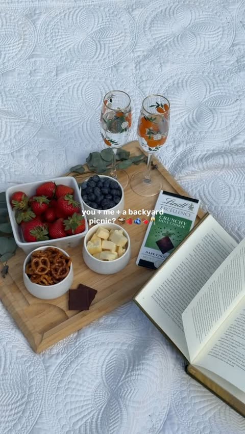 Instagram post by @autumrainn for Lindt. Caption reads: The most dreamy spring day 🌥️🧺🥂 NEW @lindt_usa....