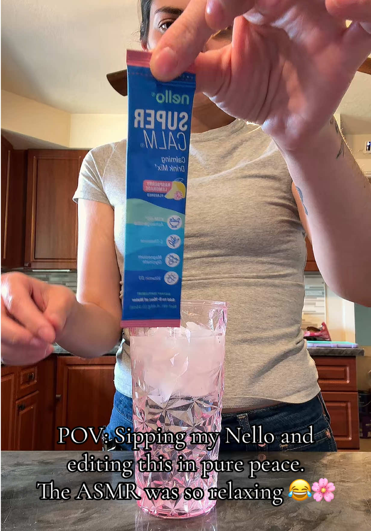 TikTok post by @cozymamalife.erica for nello. Caption reads: [...] pink drink makes it even better🥰🌸💕 @Nello....