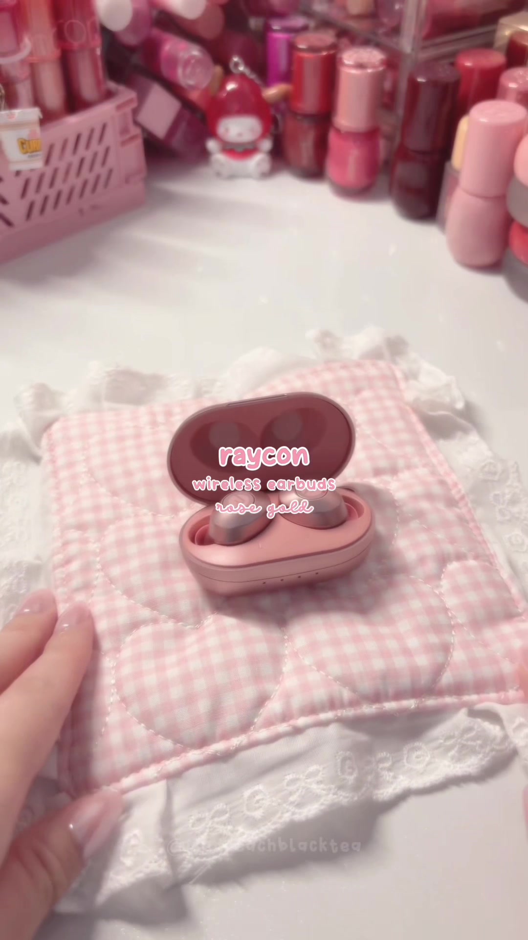TikTok post by @icedpeachblacktea for Raycon. Caption reads: [...] and pretty!? these earbuds from raycon....