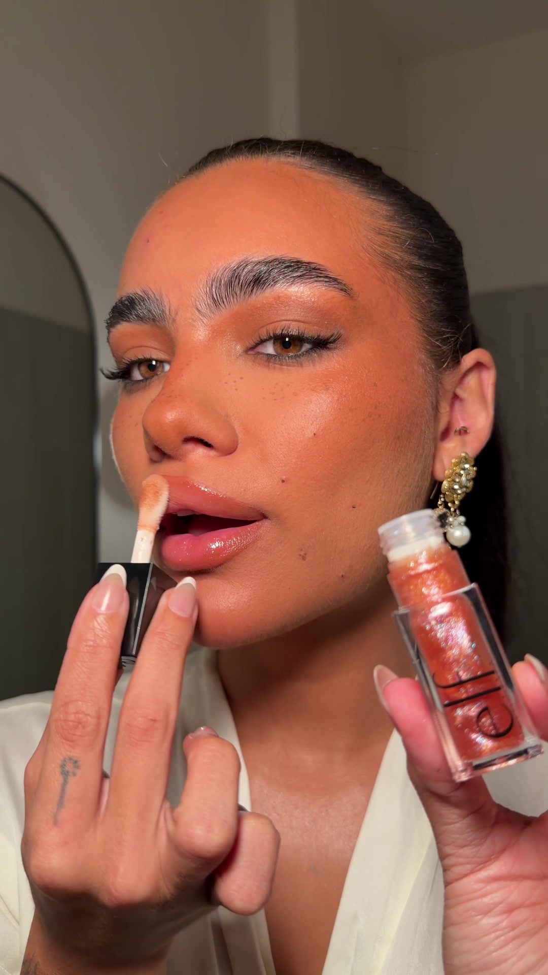 TikTok post by @luisapiou for NYLON. Caption reads: [...] was indeed popping @e.l.f. Cosmetics  x....