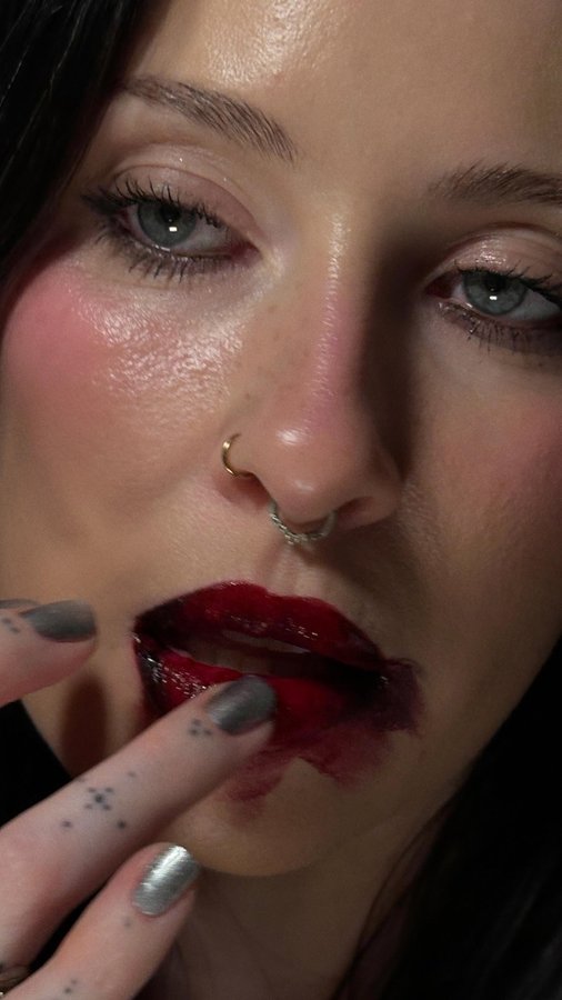 Instagram post by @alexandraclare for Kaleidos Makeup. Caption reads: tasty 🩸

Using @kaleidosmakeup Lip Clays in....