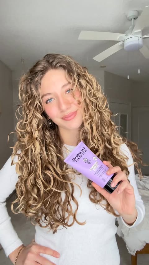 Instagram post by @adrianamariedelic for California Naturals. Caption reads: [...] Shop Dream Curls at Ulta 💜✨....