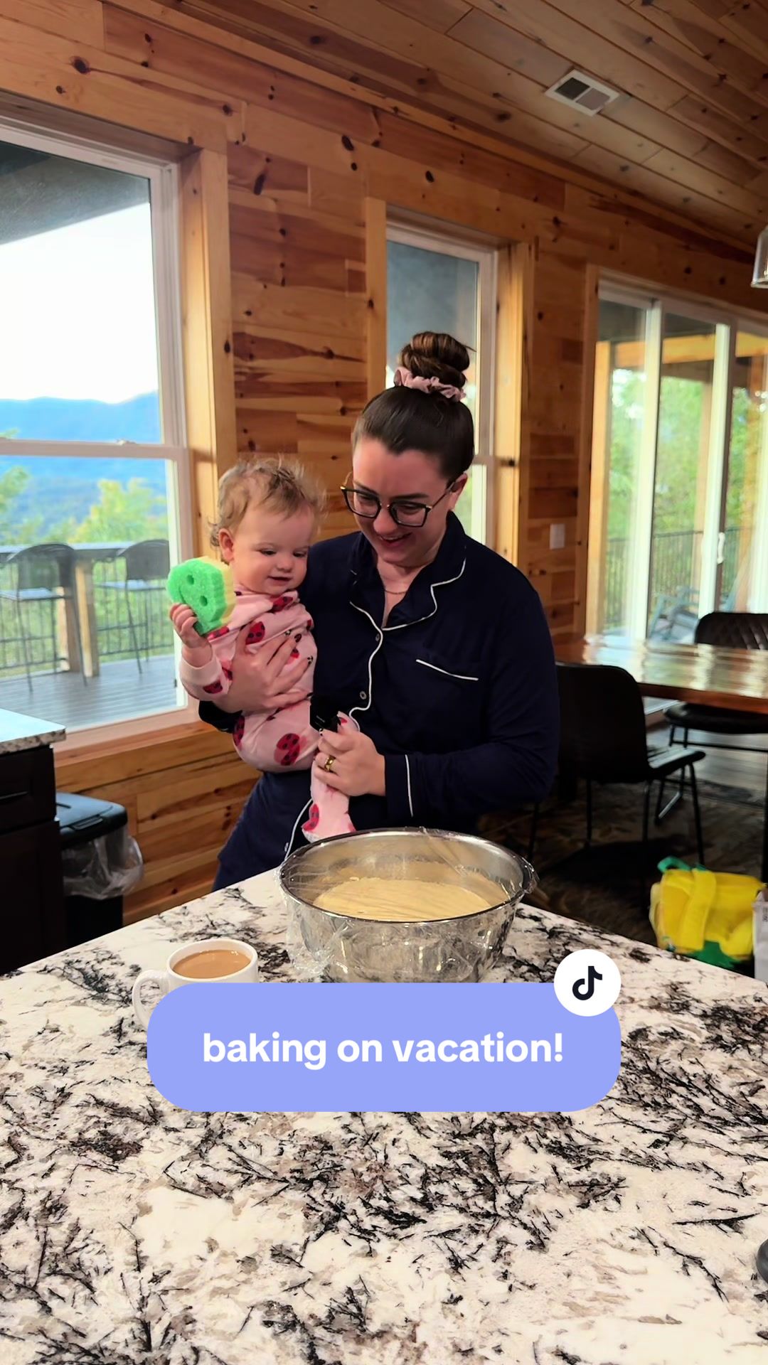 TikTok post by @skylar_toth for Scrub Daddy. Caption reads: Making cinnamon rolls for my family on vacation in....
