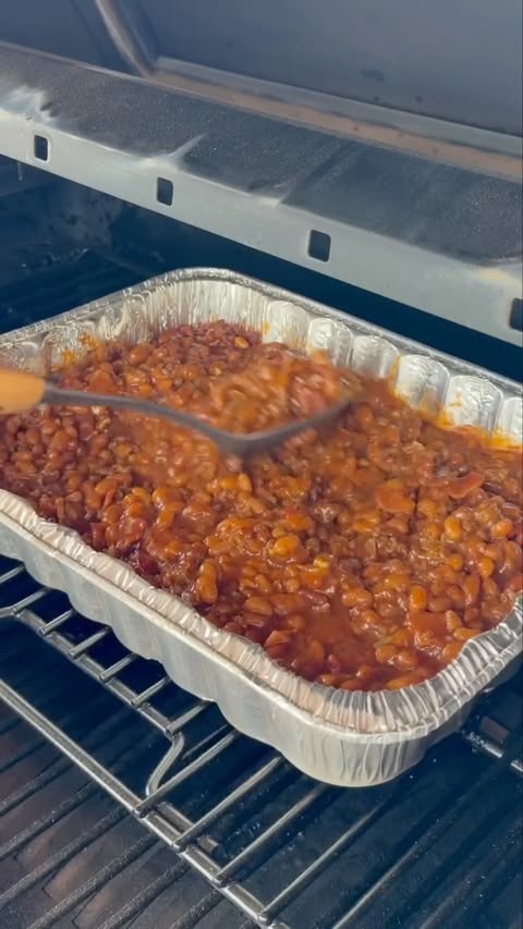Instagram post by @grillnation for Pit Boss Grills. Caption reads: [...] it all in 🔥 Threw these on the....