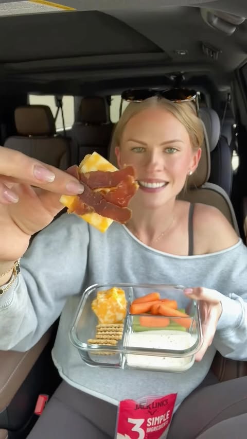 Instagram post by @smaller_sam.pcos for Jack Link's. Caption reads: CARchuterie in the pickup line🧀🥕🥩....
