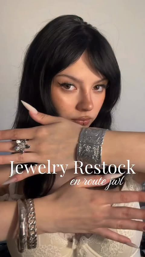 Instagram post by @strawberrykiss_3 for En Route Jewelry. Caption reads: jewelry rotation with @enroutejewelry_ #gifted....