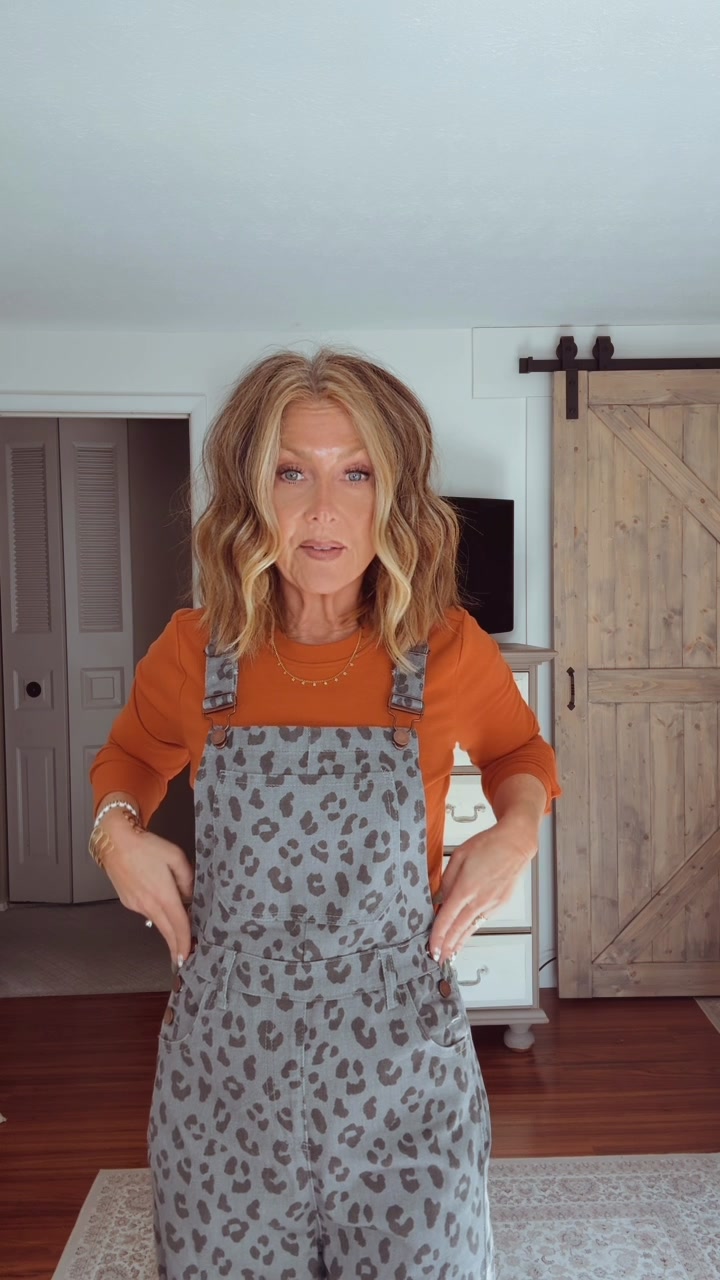 TikTok post by @teacher_turns_trendy for OmmigO. Caption reads: 🐆Comfortable overalls! 🐆Fall fashion at its....